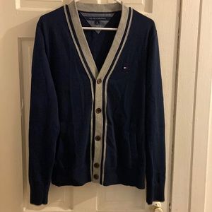 Navy blue and gray cardigan with pockets. Buttons are brown.
